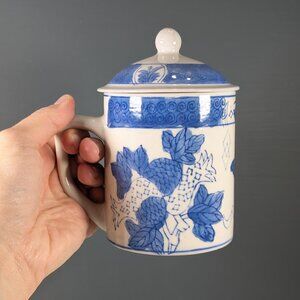 Handmade blue and white ceramic lidded tea cup, tea or coffee mug